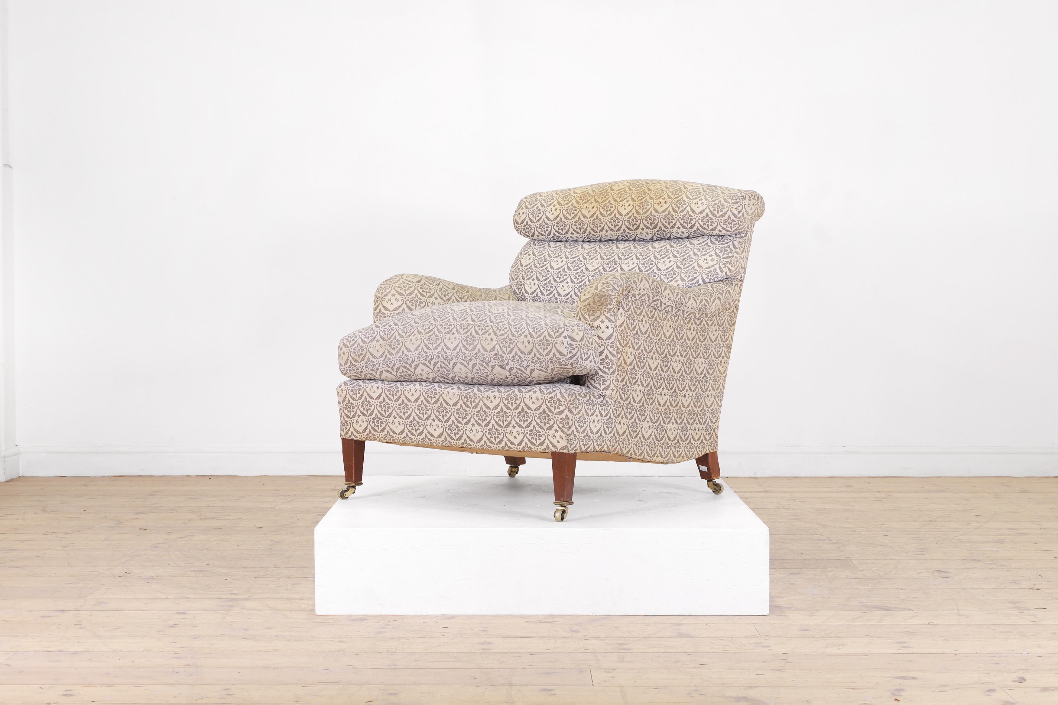 Lot 535- A 'Bridgewater' armchair by Howard & Sons (£3,000-5,000)